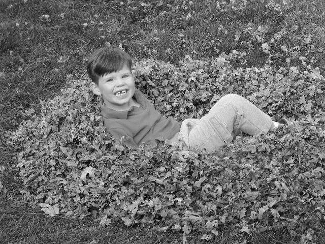 Jared In Leaves B&W